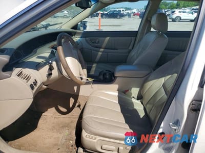 Zdjęcie 7 z 12 samochodu: 2000 TOYOTA AVALON XLS VIN:4T1BF28B2YU105194 - miniatura