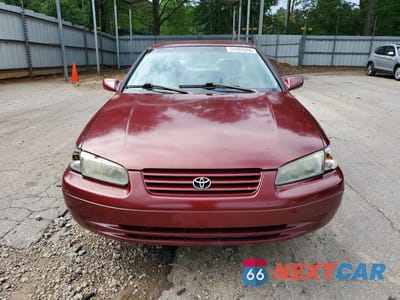 Piąte zdjęcie samochodu w środku: 1999 TOYOTA CAMRY LE VIN:4T1BG22K2XU616604 - miniatura