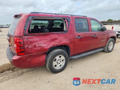Trzecie zdjęcie samochodu z tyłu: 2010 CHEVROLET SUBURBAN C1500 LS VIN:1GNUCHE07AR220773 - miniatura