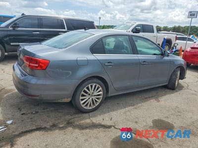 Trzecie zdjęcie samochodu z tyłu: 2015 VOLKSWAGEN JETTA SE VIN:3VWD07AJ9FM406072 - miniatura