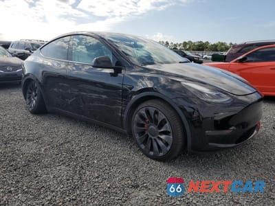 Czwarte zdjęcie samochodu z boku: 2021 TESLA MODEL Y VIN:5YJYGDEF8MF305692 - miniatura