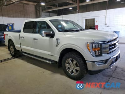 Czwarte zdjęcie samochodu z boku: 2021 FORD F150 LARIAT VIN:1FTFW1ED9MFC06852 - miniatura