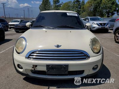 Piąte zdjęcie samochodu w środku: 2009 MINI COOPER VIN:WMWMF33559TW79765 - miniatura
