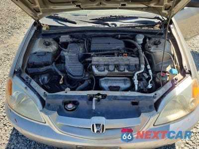 Zdjęcie 11 z 12 samochodu: 2003 HONDA CIVIC LX VIN:1HGEM22543L031058 - miniatura