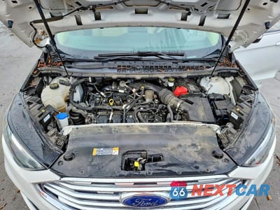 Zdjęcie 11 z 13 samochodu: 2021 FORD EDGE SEL VIN:2FMPK3J95MBA05881 - miniatura