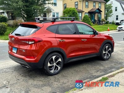 Czwarte zdjęcie samochodu z boku: 2016 HYUNDAI TUCSON LIMITED VIN:KM8J3CA26GU094705 - miniatura