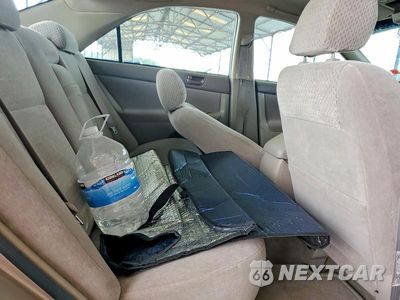 Zdjęcie 10 z 12 samochodu: 2003 TOYOTA CAMRY LE VIN:4T1BE32K13U163792 - miniatura