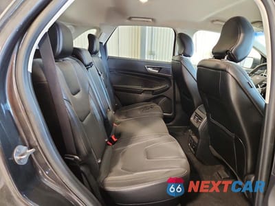 Zdjęcie 11 z 13 samochodu: 2019 FORD EDGE TITANIUM VIN:2FMPK4K96KBC73369 - miniatura