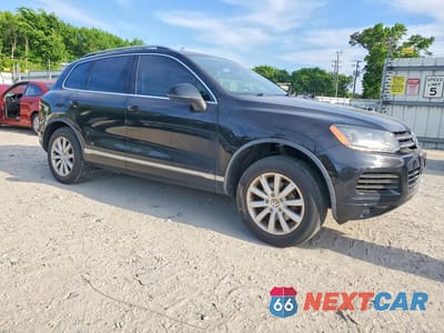 Czwarte zdjęcie samochodu z boku: 2011 VOLKSWAGEN TOUAREG V6 VIN:WVGFF9BP2BD003223 - miniatura