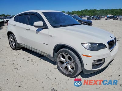 Czwarte zdjęcie samochodu z boku: 2014 BMW X6 XDRIVE35I VIN:5UXFG2C54E0H11122 - miniatura
