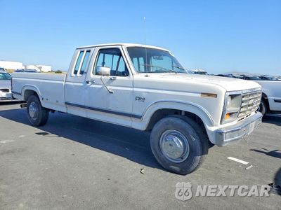 Czwarte zdjęcie samochodu z boku: 1986 FORD F250 VIN:1FTHX25L6GKB87112 - miniatura