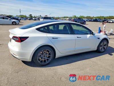 Trzecie zdjęcie samochodu z tyłu: 2021 TESLA MODEL 3 VIN:5YJ3E1EA6MF913360 - miniatura