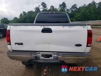 Zdjęcie 6 z 12 samochodu: 1999 FORD F150 VIN:1FTRX18L3XNA64179 - miniatura