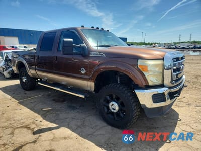 Czwarte zdjęcie samochodu z boku: 2011 FORD F350 SUPER DUTY VIN:1FT8W3BT6BEA66357 - miniatura