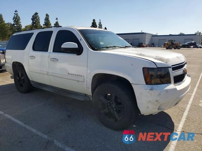 Czwarte zdjęcie samochodu z boku: 2007 CHEVROLET SUBURBAN C1500 VIN:1GNFC16007J175522 - miniatura