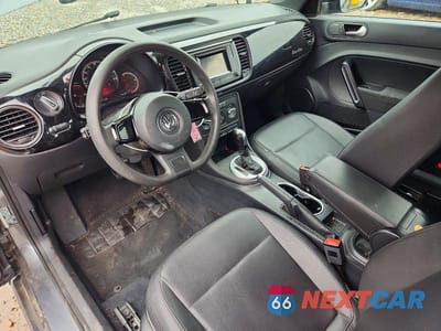 Zdjęcie 8 z 12 samochodu: 2017 VOLKSWAGEN BEETLE 1.8T VIN:3VWF17AT5HM624603 - miniatura