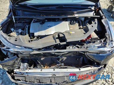 Zdjęcie 11 z 12 samochodu: 2022 TOYOTA PRIUS XLE AWD-E VIN:JTDL9MFU8N3033810 - miniatura