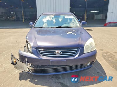 Piąte zdjęcie samochodu w środku: 2006 KIA OPTIMA LX VIN:KNAGE123865074210 - miniatura