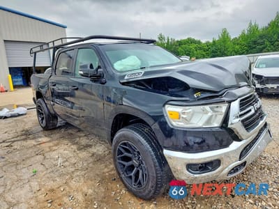 Czwarte zdjęcie samochodu z boku: 2021 RAM 1500 BIG HORN VIN:1C6RREFT3MN584440 - miniatura