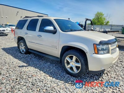 Czwarte zdjęcie samochodu z boku: 2013 CHEVROLET TAHOE K1500 LTZ VIN:1GNSKCE02DR350798 - miniatura