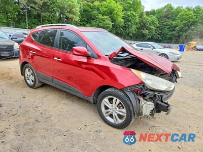 Czwarte zdjęcie samochodu z boku: 2011 HYUNDAI TUCSON GLS VIN:KM8JU3ACXBU120561 - miniatura