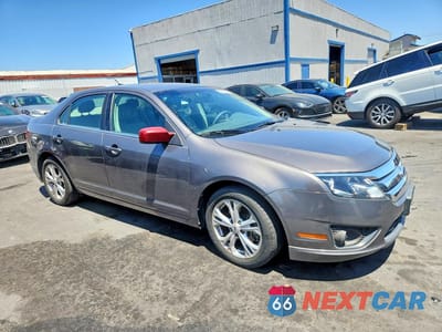 Czwarte zdjęcie samochodu z boku: 2012 FORD FUSION SE VIN:3FAHP0HA3CR212185 - miniatura
