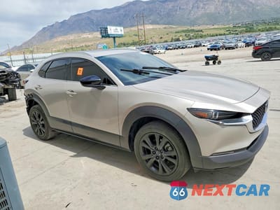 Czwarte zdjęcie samochodu z boku: 2023 MAZDA CX-30 PREMIUM VIN:3MVDMBDY2PM519705 - miniatura