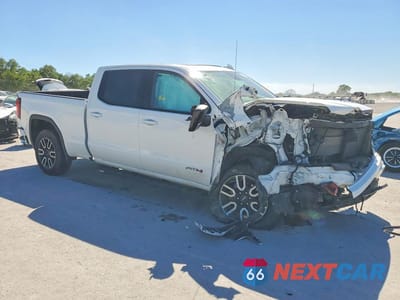 Czwarte zdjęcie samochodu z boku: 2023 GMC SIERRA K1500 AT4 VIN:3GTUUEE85PG236148 - miniatura