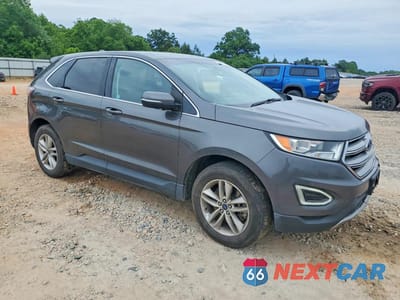Czwarte zdjęcie samochodu z boku: 2018 FORD EDGE SEL VIN:2FMPK4J97JBC09387 - miniatura