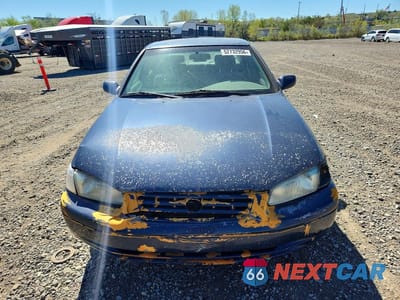 Piąte zdjęcie samochodu w środku: 1999 TOYOTA CAMRY LE VIN:4T1BF22K0XU931663 - miniatura