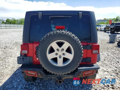 Zdjęcie 6 z 13 samochodu: 2012 JEEP WRANGLER UNLIMITED RUBICON VIN:1C4HJWFG0CL100108 - miniatura
