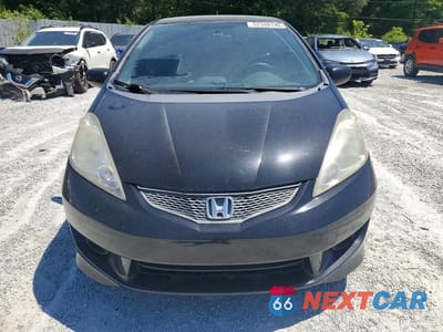 Piąte zdjęcie samochodu w środku: 2009 HONDA FIT SPORT VIN:JHMGE88419S027603 - miniatura