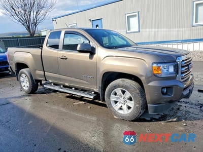 Czwarte zdjęcie samochodu z boku: 2016 GMC CANYON SLE VIN:1GTH6CE36G1101747 - miniatura