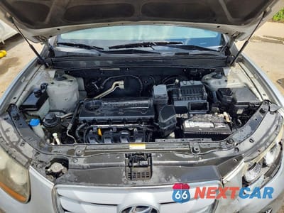 Zdjęcie 12 z 13 samochodu: 2010 HYUNDAI SANTA FE GLS VIN:5NMSG3AB7AH347722 - miniatura