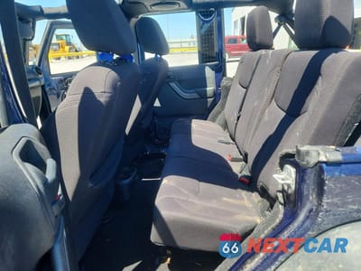 Zdjęcie 10 z 13 samochodu: 2013 JEEP WRANGLER UNLIMITED SPORT VIN:1C4BJWDG1DL513648 - miniatura