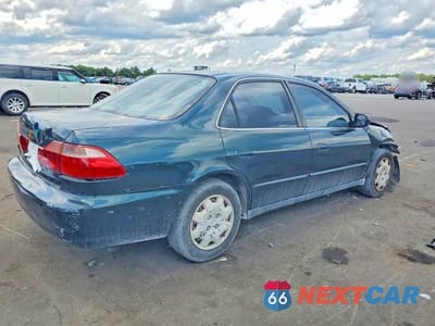 Trzecie zdjęcie samochodu z tyłu: 1999 HONDA ACCORD LX VIN:1HGCG5640XA013045 - miniatura