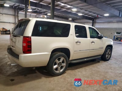 Trzecie zdjęcie samochodu z tyłu: 2013 CHEVROLET SUBURBAN K1500 LTZ VIN:1GNSKKE78DR299119 - miniatura