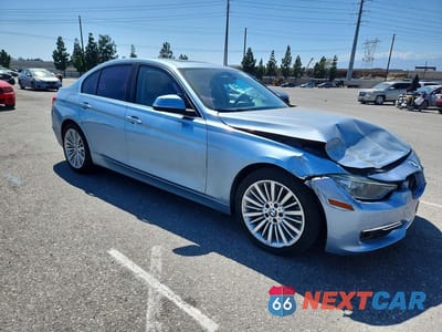 Czwarte zdjęcie samochodu z boku: 2014 BMW 335 I VIN:WBA3A9C54EF477960 - miniatura