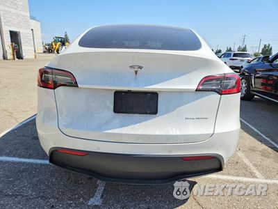 Zdjęcie 6 z 13 samochodu: 2022 TESLA MODEL Y VIN:7SAYGDEE9NF458478 - miniatura