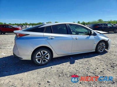 Trzecie zdjęcie samochodu z tyłu: 2016 TOYOTA PRIUS FOUR TOURING VIN:JTDKARFUXG3518811 - miniatura