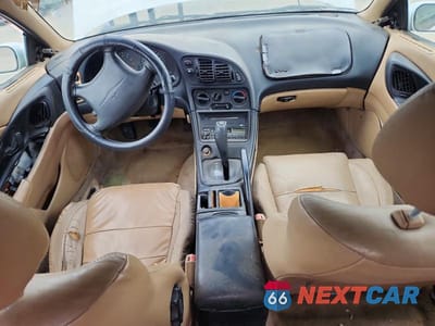 Zdjęcie 8 z 12 samochodu: 1999 MITSUBISHI ECLIPSE SPYDER GS VIN:4A3AX35G7XE011398 - miniatura