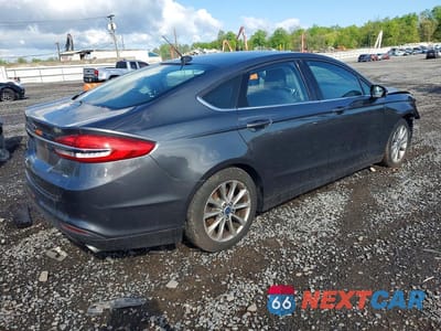 Trzecie zdjęcie samochodu z tyłu: 2017 FORD FUSION SE VIN:3FA6P0H71HR107003 - miniatura