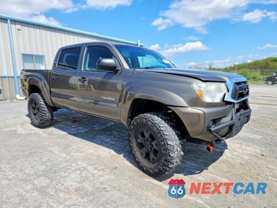 Czwarte zdjęcie samochodu z boku: 2014 TOYOTA TACOMA DOUBLE CAB VIN:5TFLU4EN3EX098792 - miniatura