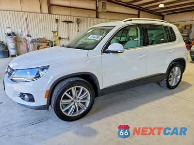 2014 VOLKSWAGEN TIGUAN S WVGBV3AXXEW542858 - główne zdjęcie licytacji z USA - miniatura