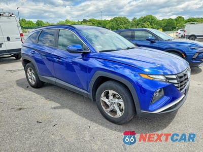 Czwarte zdjęcie samochodu z boku: 2023 HYUNDAI TUCSON SEL VIN:5NMJBCAE6PH174403 - miniatura