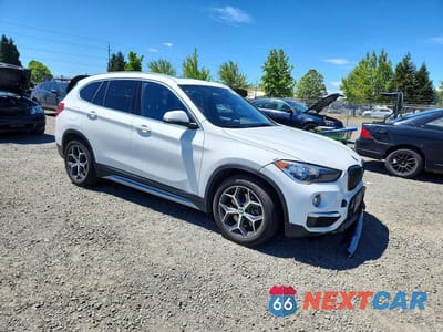 Czwarte zdjęcie samochodu z boku: 2019 BMW X1 XDRIVE28I VIN:WBXHT3C54K5L89219 - miniatura