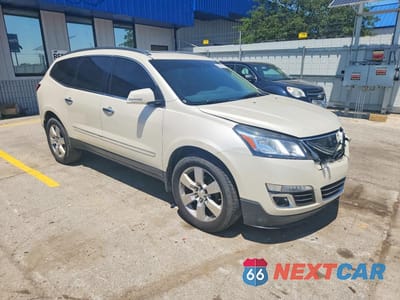 Czwarte zdjęcie samochodu z boku: 2014 CHEVROLET TRAVERSE LTZ VIN:1GNKRJKD0EJ287014 - miniatura