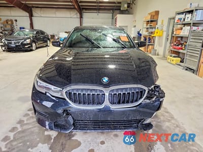 Piąte zdjęcie samochodu w środku: 2021 BMW 330I VIN:3MW5R1J05M8C09663 - miniatura