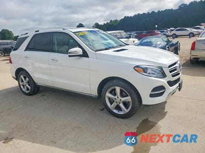 Czwarte zdjęcie samochodu z boku: 2016 MERCEDES-BENZ GLE 350 VIN:4JGDA5JB0GA738635 - miniatura