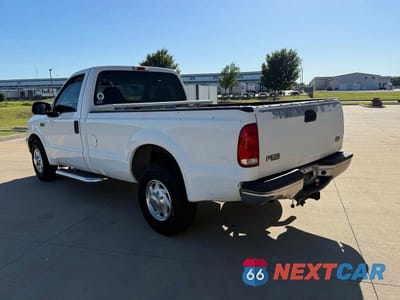 Trzecie zdjęcie samochodu z tyłu: 2002 FORD F250 SUPER DUTY VIN:1FTNF20L72EC88180 - miniatura